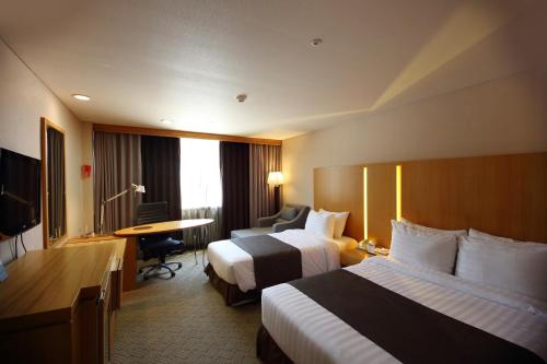 Imagen de la habitación del Hotel Ramada by Wyndham Songdo. Foto 9
