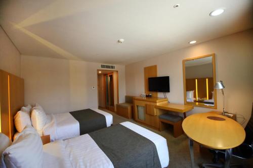 Imagen de la habitación del Hotel Ramada by Wyndham Songdo. Foto 12