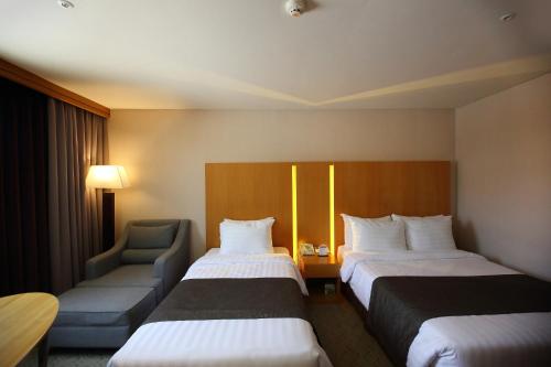 Imagen de la habitación del Hotel Ramada by Wyndham Songdo. Foto 13