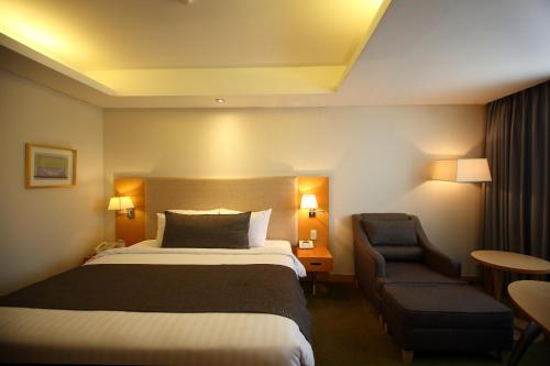 Imagen de la habitación del Hotel Ramada by Wyndham Songdo. Foto 14