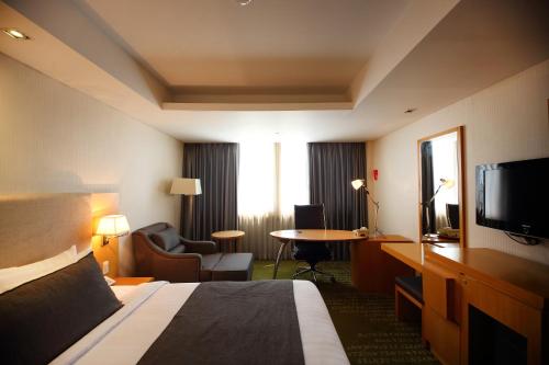 Imagen de la habitación del Hotel Ramada by Wyndham Songdo. Foto 15