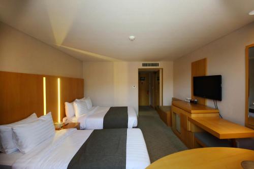 Imagen de la habitación del Hotel Ramada by Wyndham Songdo. Foto 16