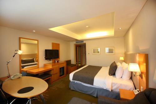 Imagen de la habitación del Hotel Ramada by Wyndham Songdo. Foto 19
