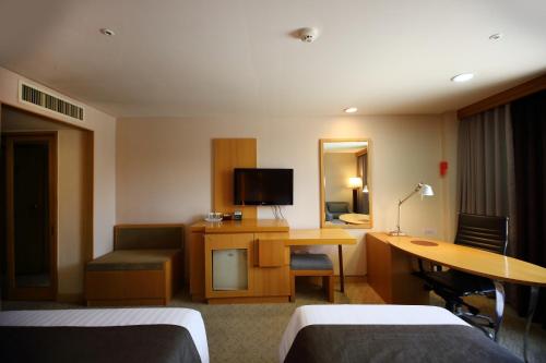 Imagen de la habitación del Hotel Ramada by Wyndham Songdo. Foto 20
