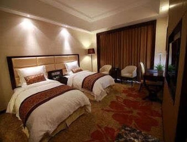 Imagen de la habitación del Hotel Ramada by Wyndham Suzhou Wujiang. Foto 4