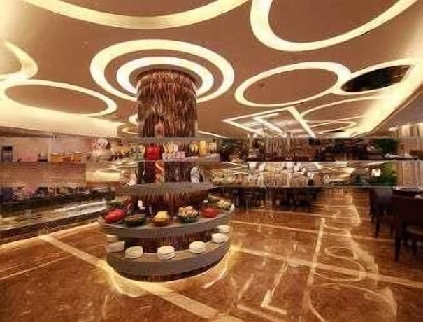 Imagen del bar/restaurante del Hotel Ramada by Wyndham Suzhou Wujiang. Foto 2