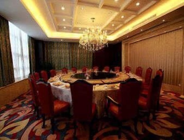 Imagen del bar/restaurante del Hotel Ramada by Wyndham Suzhou Wujiang. Foto 3