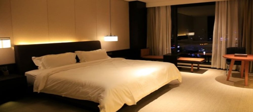 Imagen de la habitación del Hotel Ramada by Wyndham Taizhou. Foto 7