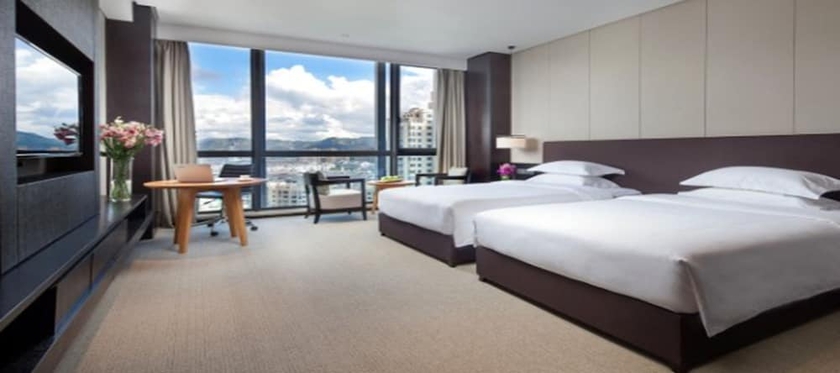 Imagen de la habitación del Hotel Ramada by Wyndham Taizhou. Foto 8