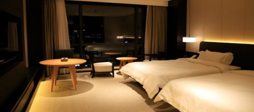 Imagen de la habitación del Hotel Ramada by Wyndham Taizhou. Foto 9