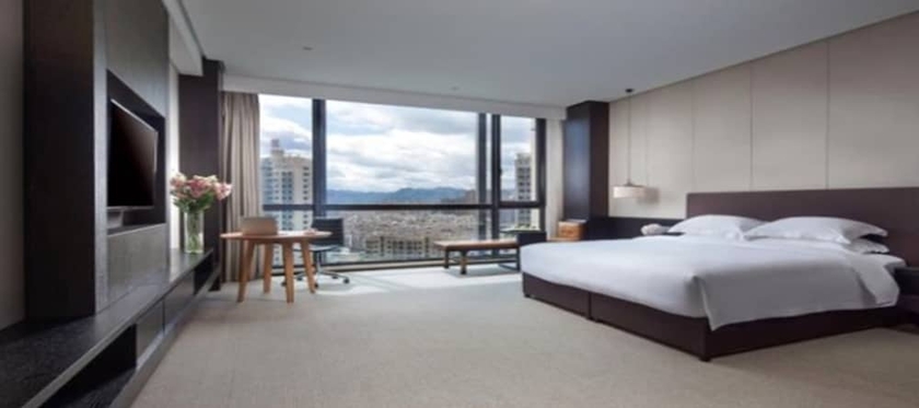 Imagen de la habitación del Hotel Ramada by Wyndham Taizhou. Foto 10