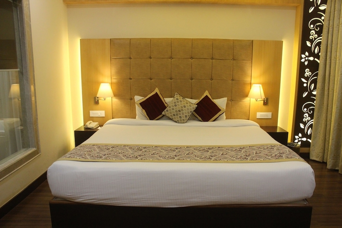 Imagen de la habitación del Hotel Ramada by Wyndham Varanasi Katesar. Foto 4
