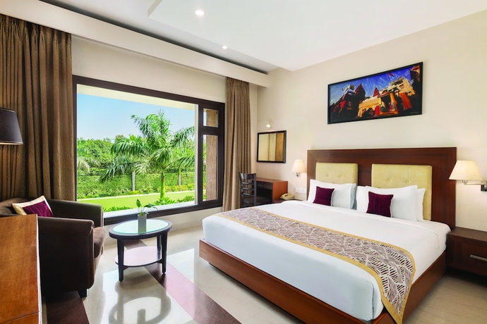 Imagen de la habitación del Hotel Ramada by Wyndham Varanasi Katesar. Foto 6