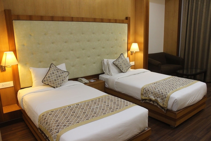 Imagen de la habitación del Hotel Ramada by Wyndham Varanasi Katesar. Foto 7