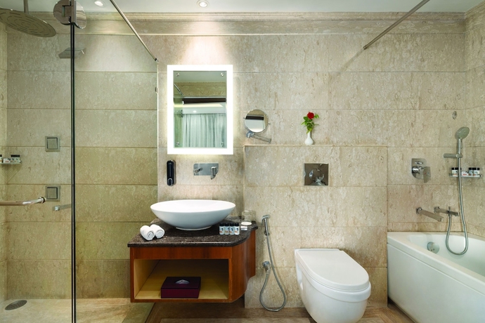 Imagen de la habitación del Hotel Ramada by Wyndham Varanasi Katesar. Foto 16