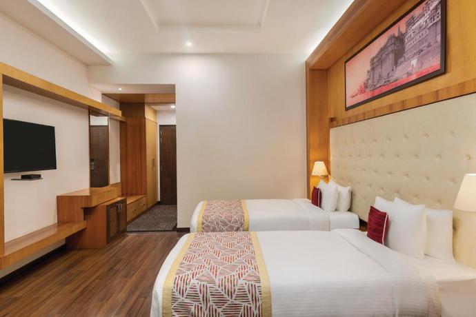 Imagen de la habitación del Hotel Ramada by Wyndham Varanasi Katesar, Varanasi. Foto 10