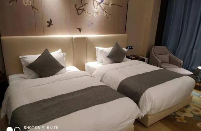 Imagen de la habitación del Hotel Ramada by Wyndham Wuhan Dongxihu. Foto 4