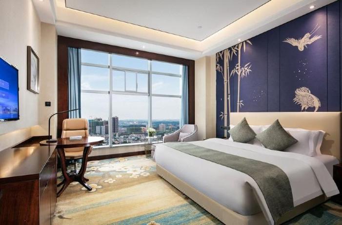 Imagen de la habitación del Hotel Ramada by Wyndham Wuhan Dongxihu. Foto 7