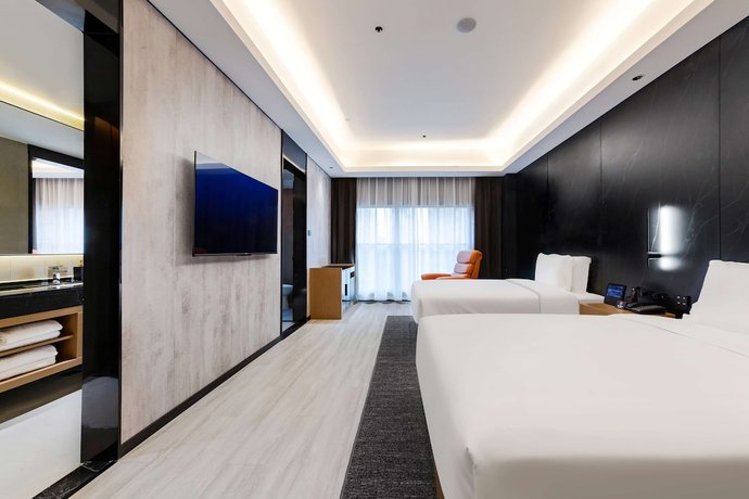 Imagen de la habitación del Hotel Ramada by Wyndham Wuhan Hankou. Foto 7