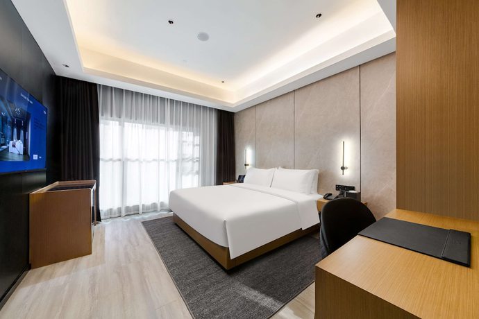 Imagen de la habitación del Hotel Ramada by Wyndham Wuhan Hankou. Foto 11