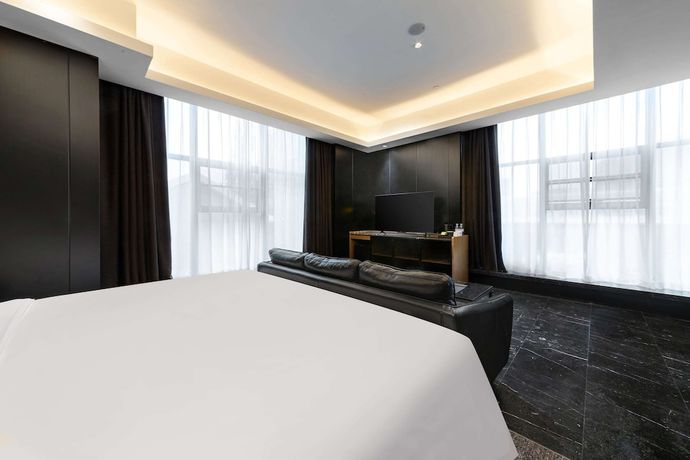 Imagen de la habitación del Hotel Ramada by Wyndham Wuhan Hankou. Foto 12