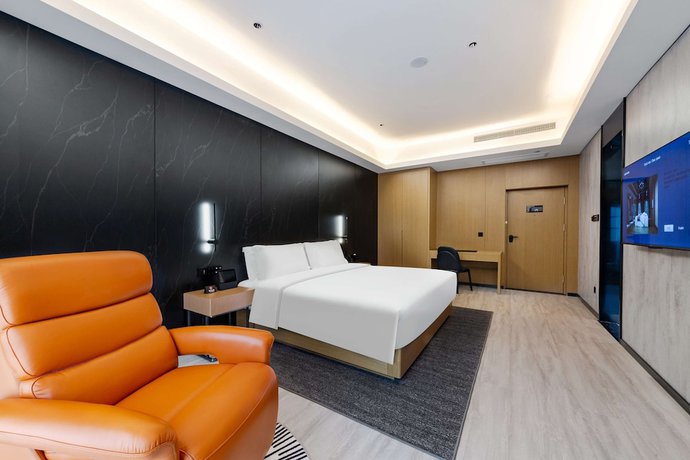 Imagen de la habitación del Hotel Ramada by Wyndham Wuhan Hankou. Foto 14