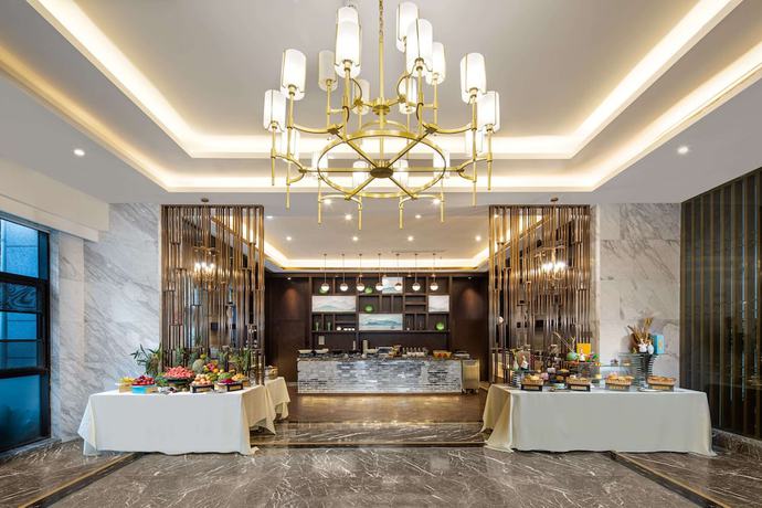 Imagen del bar/restaurante del Hotel Ramada by Wyndham Wuhan Qingshan. Foto 5