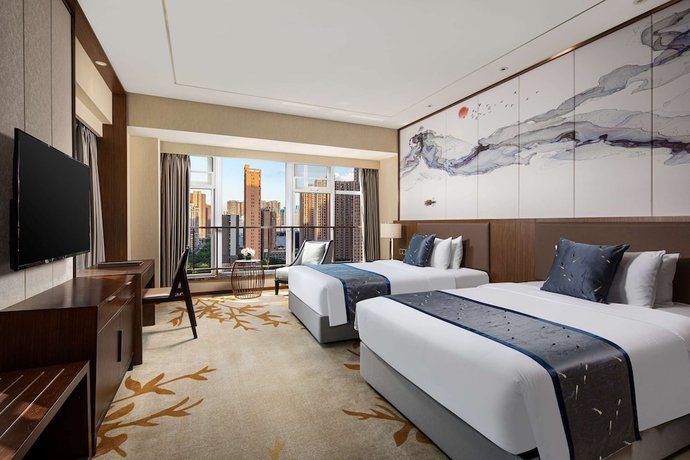 Imagen de la habitación del Hotel Ramada by Wyndham Wuhan Qingshan. Foto 9