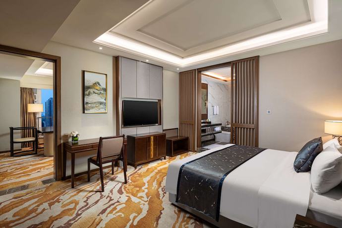 Imagen de la habitación del Hotel Ramada by Wyndham Wuhan Qingshan. Foto 10