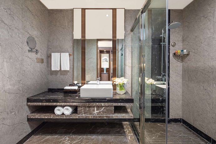 Imagen de la habitación del Hotel Ramada by Wyndham Wuhan Qingshan. Foto 11