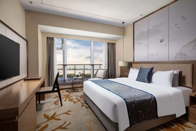Imagen de la habitación del Hotel Ramada by Wyndham Wuhan Qingshan. Foto 12