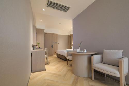Imagen de la habitación del Hotel Ramada by Wyndham Wuhan Wangjiawan. Foto 5