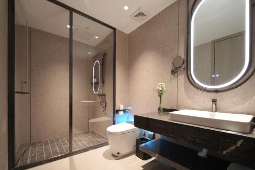 Imagen de la habitación del Hotel Ramada by Wyndham Wuhan Wangjiawan. Foto 8