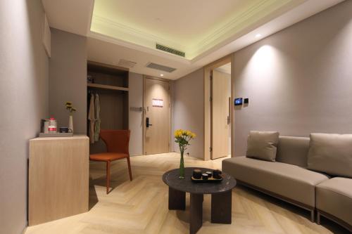 Imagen de la habitación del Hotel Ramada by Wyndham Wuhan Wangjiawan. Foto 11