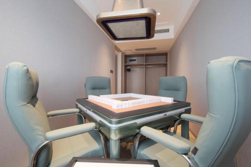 Imagen de la habitación del Hotel Ramada by Wyndham Wuhan Wangjiawan. Foto 19