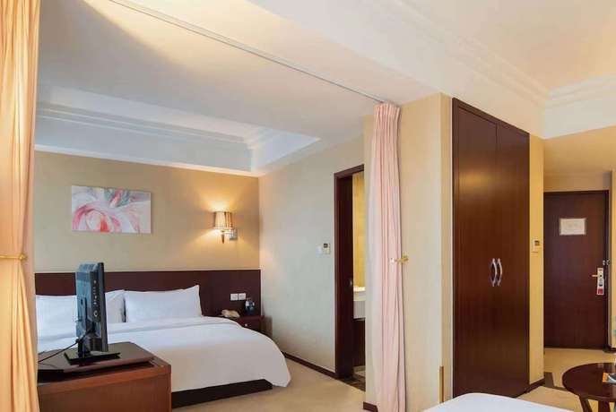 Imagen de la habitación del Hotel Ramada by Wyndham Wujiaochang Shanghai. Foto 4