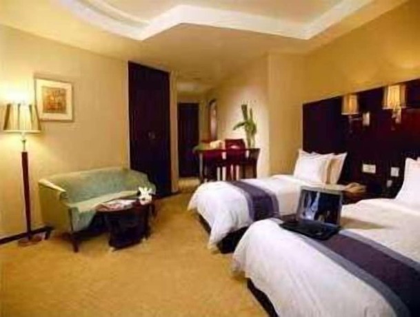 Imagen de la habitación del Hotel Ramada by Wyndham Wujiaochang Shanghai. Foto 10