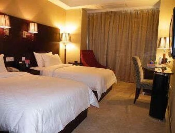 Imagen de la habitación del Hotel Ramada by Wyndham Wujiaochang Shanghai. Foto 12