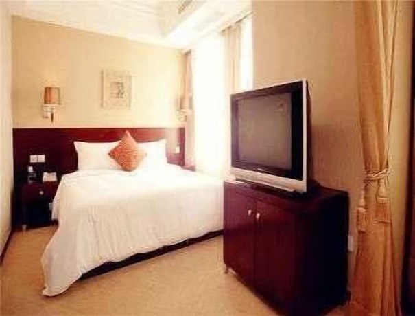 Imagen de la habitación del Hotel Ramada by Wyndham Wujiaochang Shanghai. Foto 13