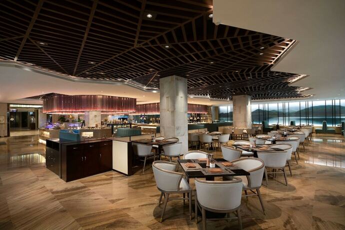 Imagen del bar/restaurante del Hotel Ramada by Wyndham Xi'an Long march. Foto 3