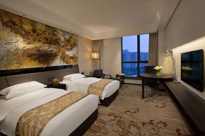 Imagen de la habitación del Hotel Ramada by Wyndham Xi'an Long march. Foto 4