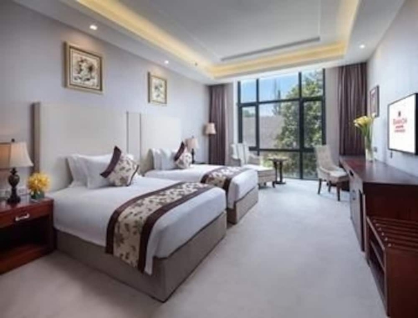 Imagen de la habitación del Hotel Ramada by Wyndham Xianning Chongyang. Foto 4