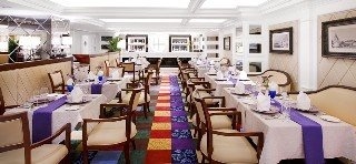 Imagen del bar/restaurante del Hotel Ramada by Wyndham Yichang. Foto 7