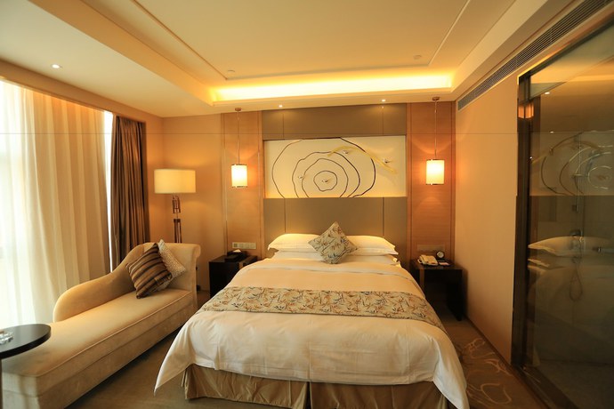 Imagen de la habitación del Hotel Ramada by Wyndham Yiyang Taojiang. Foto 3
