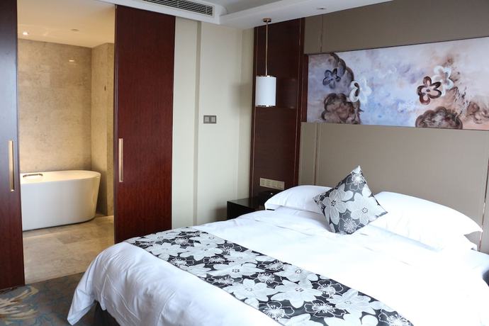 Imagen de la habitación del Hotel Ramada by Wyndham Yiyang Taojiang. Foto 6