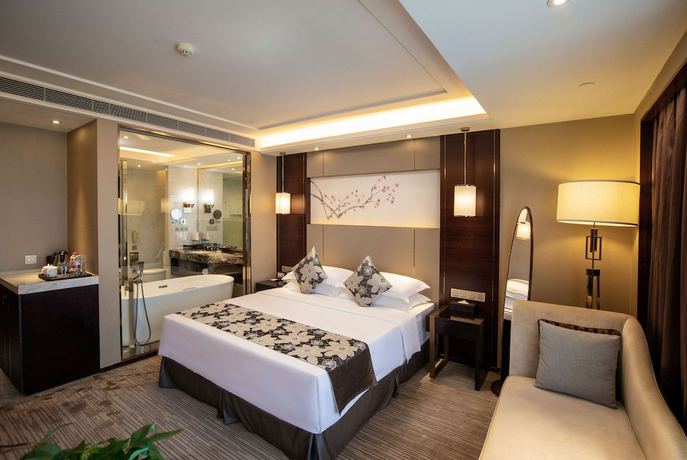 Imagen de la habitación del Hotel Ramada by Wyndham Yiyang Taojiang. Foto 7