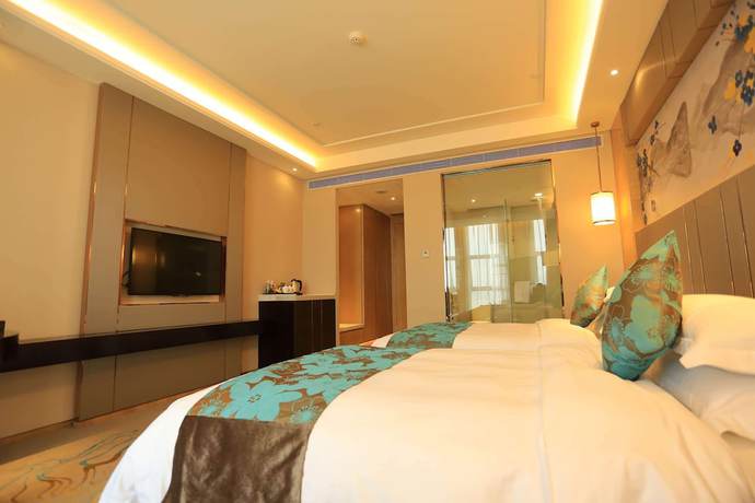 Imagen de la habitación del Hotel Ramada by Wyndham Yiyang Taojiang. Foto 9