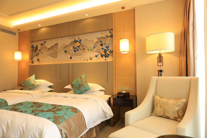 Imagen de la habitación del Hotel Ramada by Wyndham Yiyang Taojiang. Foto 10
