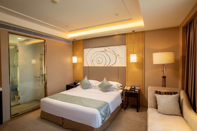 Imagen de la habitación del Hotel Ramada by Wyndham Yiyang Taojiang. Foto 11