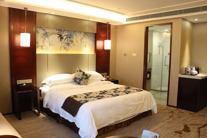 Imagen de la habitación del Hotel Ramada by Wyndham Yiyang Taojiang. Foto 12